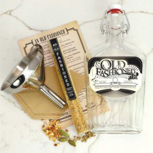 Old Fashioned Alcohol Infusion Kit with spices, funnel, paper filter, and labeled bottle for DIY cocktail enthusiasts